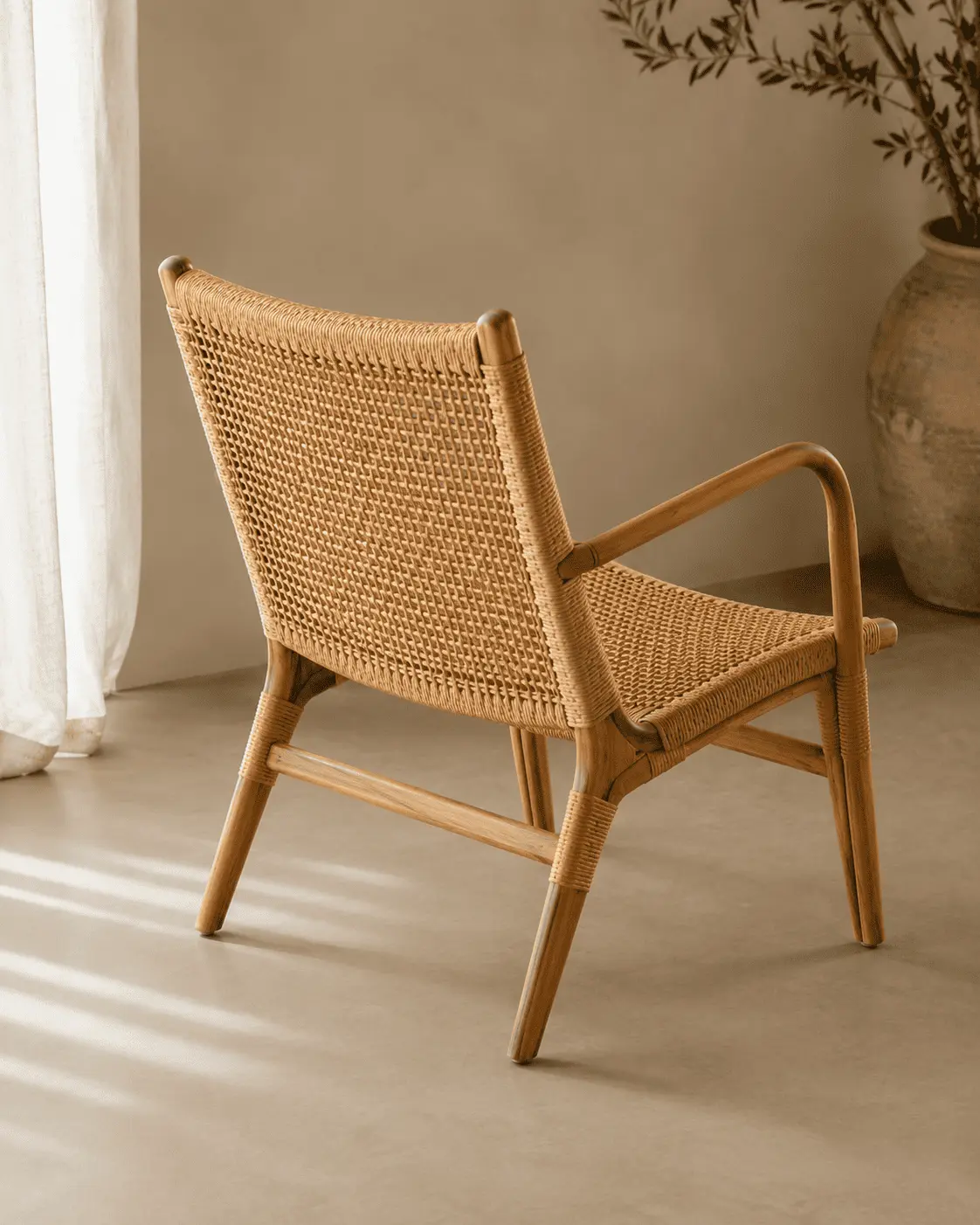 Arunika Rattan Lounge Chair side view